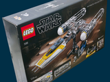 a box of lego star wars sets on a blue background