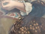 a painting of a woman holding a basket of grapes