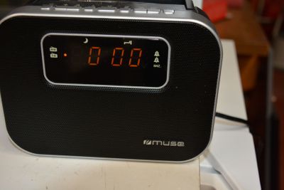 a clock that is sitting on top of a table