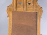 a picture of a wooden frame with a mirror on it
