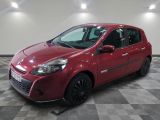 a picture of a red car parked on a checkered floor