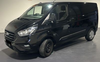 the black van is parked in the garage of the building