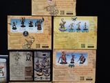 a lot of different figurines on display on the table