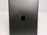 the back of an apple ipad with a small screen on a white surface