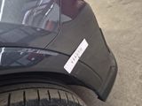 a close up of a car with a sticker on it ' s hood