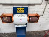 an image of a machine with a number plate on it
