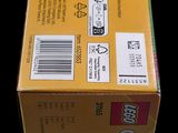 a box of legos sitting on a black surface