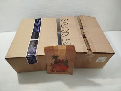 three boxes of books sitting on a white table