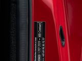 a close up of a piece of luggage with a sticker on it