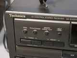 a close up of a radio with a remote on it