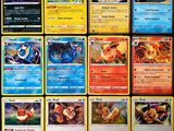 Plusieurs cartes Pokémon sont disposées sur une surface noire