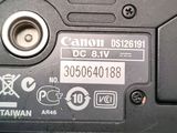 a close up picture of a camera with a button on it