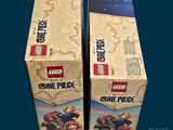two boxes of legos that are sitting on a table