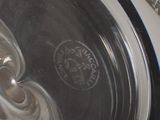 a close up view of a washing machine with the door open