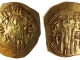 une pièce d'or portant l'image d'un homme et d'une femme