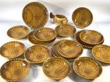 a lot of bowls and bowls that are sitting on a table