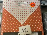 an envelope with a polka dot pattern on it
