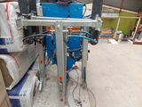 a picture of a machine that is sitting in a warehouse