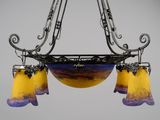 an image of a chandelier with three glass shades