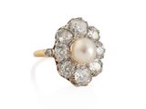 an antique pearl and diamond cluster ring