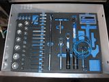 a box with a bunch of tools inside of it