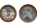 Un tableau représentant une femme et un homme est présenté dans un cadre
