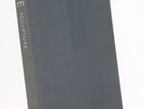 the book is sitting on a white surface with a white background