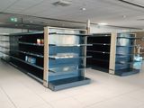 many empty shelves in a store that are empty