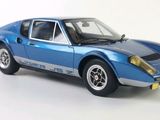 a blue model of a sports car on a white background