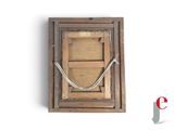 a picture of an old wooden picture frame with a rope hanging from it