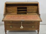 an old wooden desk with drawers and drawers on top of it