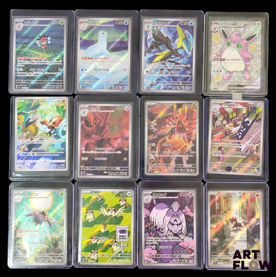 beaucoup de cartes pokemon différentes sur la table