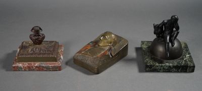 three different types of figurines sitting on top of a table