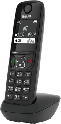 a close up of a phone on a stand on a white background