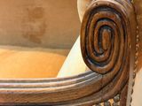 a close up of the back of a chair with buttons on it
