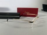 pair of glasses on a table next to a box of glasses