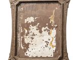 a picture of an old picture frame on the wall