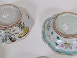 several different types of vases are displayed on a white surface