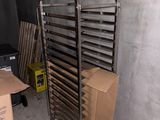 a metal rack that is in the middle of a room