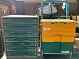 a cart that has many different colored drawers on it