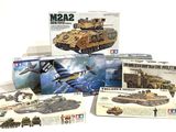 a lot of military toys that are sitting on a table