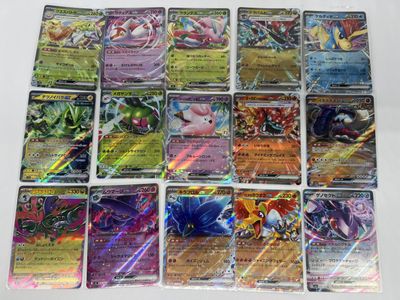 the pokemon cards are lined up on a white surface