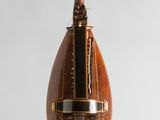 a small wooden object hanging from the ceiling