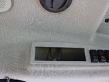 a picture of a car ' s dashboard with a digital display