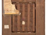 an old picture of a wooden door with a sign on it
