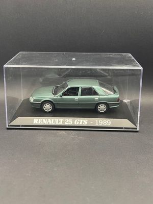 a close up of a green toy car in a clear box