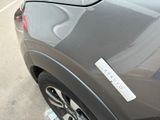 a close up of a car with a sticker on the side of it
