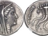 a silver coin with a woman ' s head on it