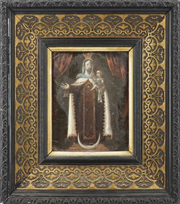 un tableau représentant une femme tenant un enfant dans un cadre en or