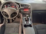 a car dashboard with a steering wheel and a dash board
